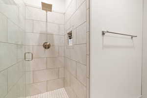 Full bathroom with a stall shower