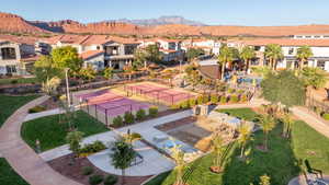 Aerial perspective of suburban area featuring a mountain backdrop