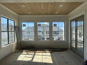 Dining nook  featuring french doors and healthy amount of natural light
