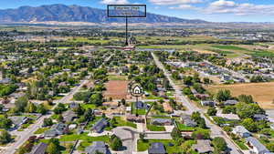 Aerial view of residential area with a mountain backdrop