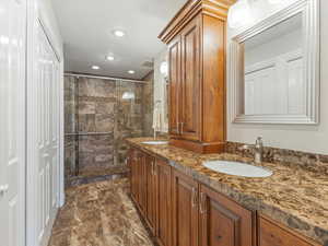 Primary Bathroom with Double Sinks and an Oversized Shower