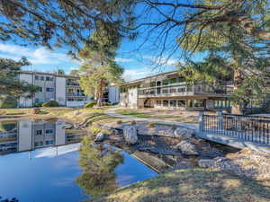 Summertime Photo of Pond and Community Clubhouse