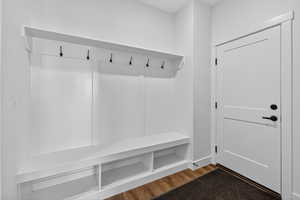 Mudroom featuring wood finished floors