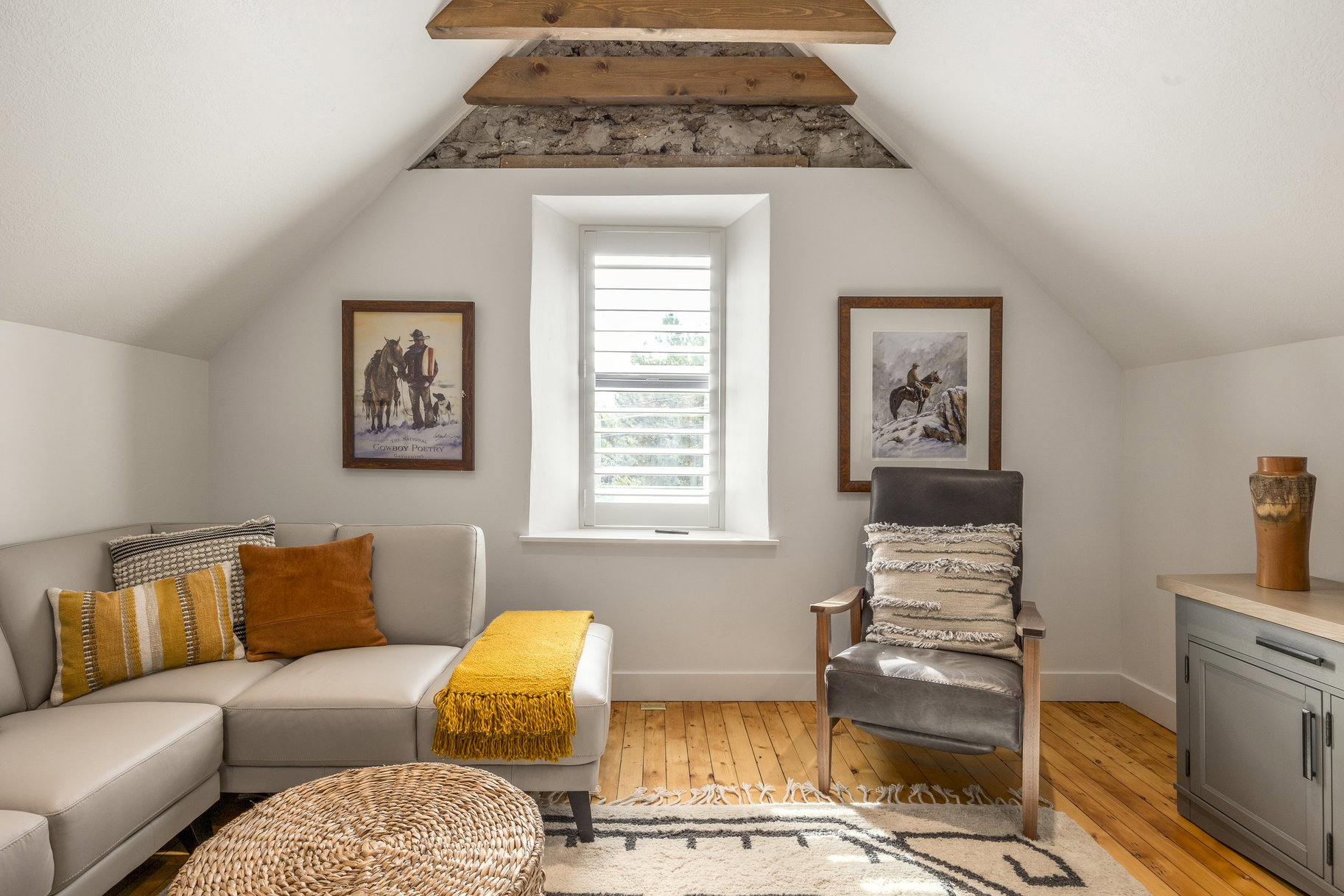 Sitting room featuring light wood-style flooring and baseboards