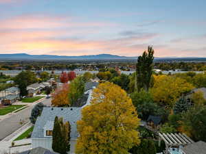 Aerial view at dusk of a mountain view and a residential view