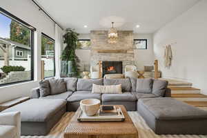 Living area featuring a fireplace and recessed lighting