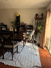 Dining area featuring a textured ceiling