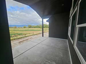 View of patio featuring a view of countryside