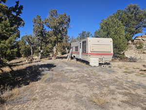 RV Spot with Water & Power Hookups! Camper will be removed