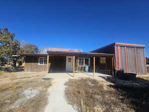 Back of Home with Covered Patio