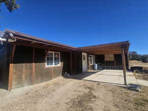 Back of Home with Covered Patio