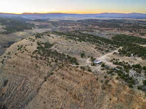 Aerial view at dusk of a view of countryside and a mountain view