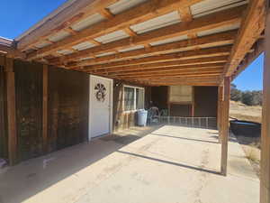 Back of Home with Covered Patio