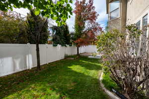Fenced backyard featuring a patio area