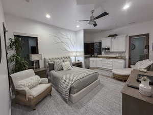 Bedroom with recessed lighting, a ceiling fan, and light wood-style flooring