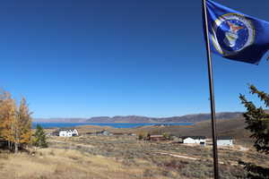 View of mountain backdrop with a nearby body of water