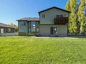 Rear View (East Side) with Deck and Large Patio