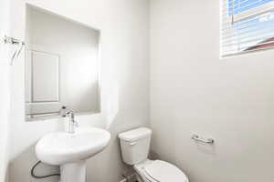 Bathroom with toilet and a sink