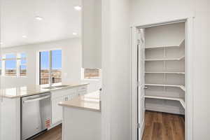 **DISCLAIMER- exterior and interior options will vary**Storage area with a sink