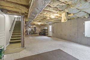Below grade area featuring stairway