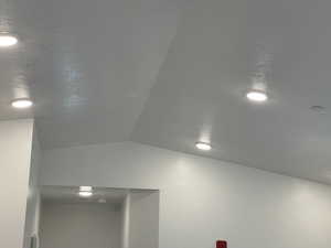Detailed view of a textured ceiling and recessed lighting