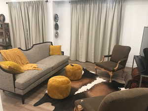 Sitting room featuring wood finished floors