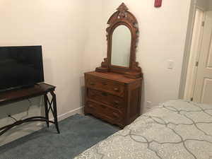 Bedroom with baseboards