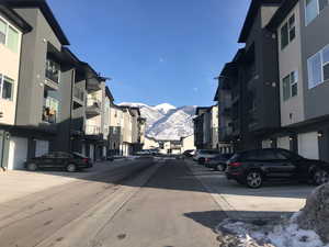 View of asphalt street with a mountain view