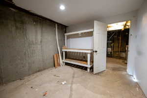 Unfinished below grade area with strapped water heater