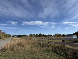 View of yard with a view of countryside