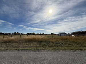 View of yard with a view of rural / pastoral area