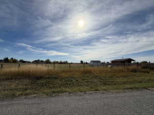 View of yard featuring a view of rural / pastoral area