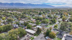 Aerial view of residential area featuring a mountain backdrop