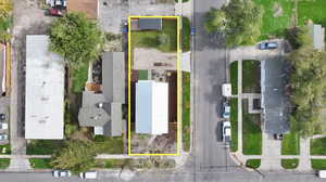 Aerial perspective of suburban area with property boundaries highlighted