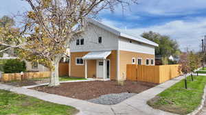 View of front of property with board and batten siding