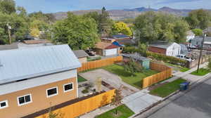 Aerial view of residential area with a mountain backdrop