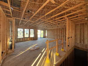 Open concept living room, kitchen, & dining room