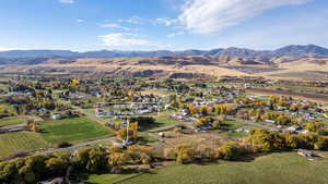 Aerial overview of property's location with a mountain backdrop
