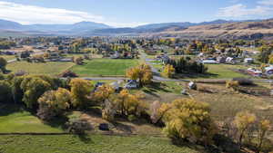 Overview of rural landscape with a mountain backdrop