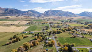 Overview of rural landscape with a mountainous background and abundant farmland