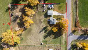 Aerial view of property and surrounding area with property boundaries highlighted