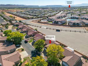 Aerial view of residential area featuring a mountain backdrop