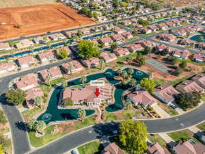 View of property location with nearby suburban area