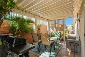 View of patio / terrace featuring a grill