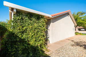View of side of property with stucco siding