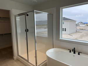 Full bath with a soaking tub,