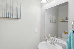 Half bathroom with a sink