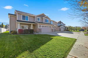 Craftsman inspired home with driveway, a garage, and a porch