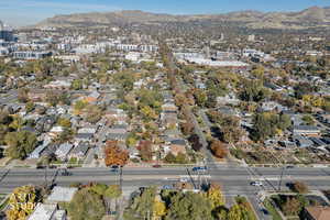 Aerial overview of property's location featuring a mountainous background