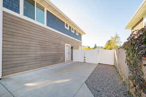 View of side of property featuring a patio area